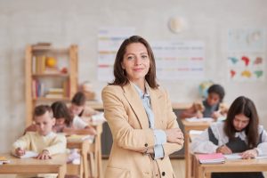 Proud Teacher in School ~ SilverState Web Design
